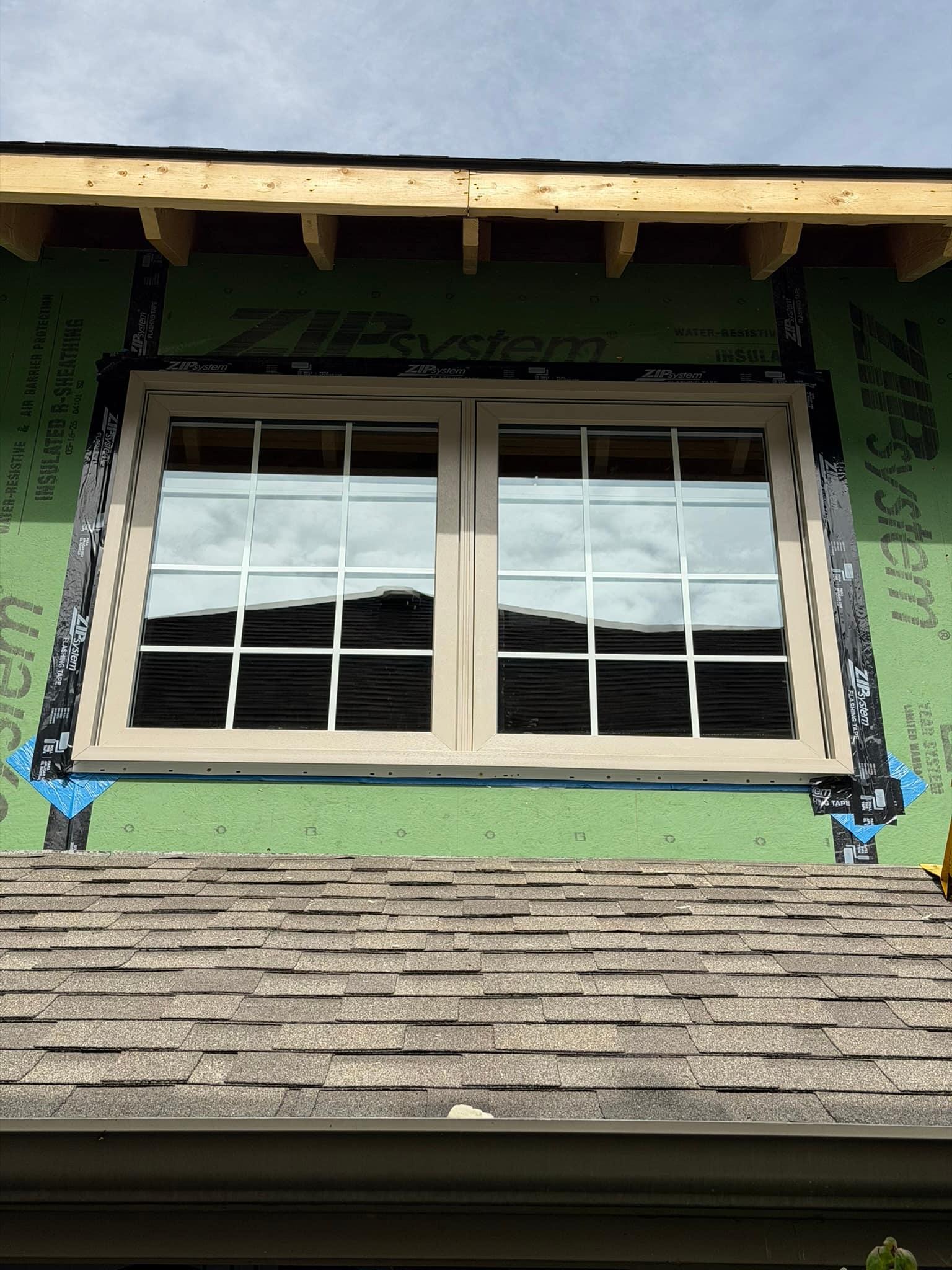 Nail fin taped to the sheathing around the installed window